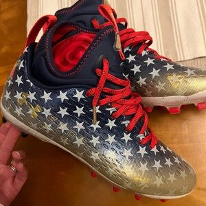 Under Armour Athletic Shoes- men’s football cleats- Navy, Red, Gold Stars—NEW!